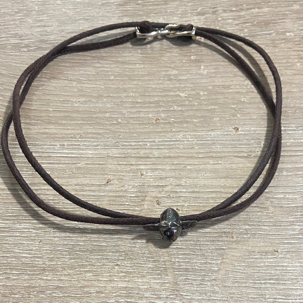 Brown Cord Choker Like Necklace with Metallic Flying Pig Figure
